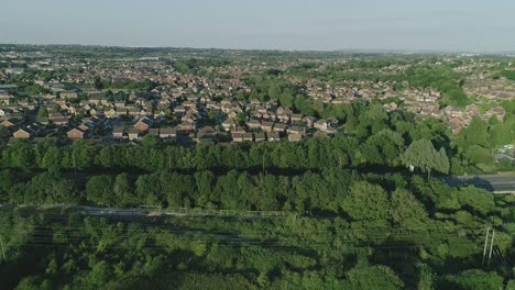 Aerial-shot-flying-across-newt-ponds-at-Mouldon-Hill-Country-Park-in-England