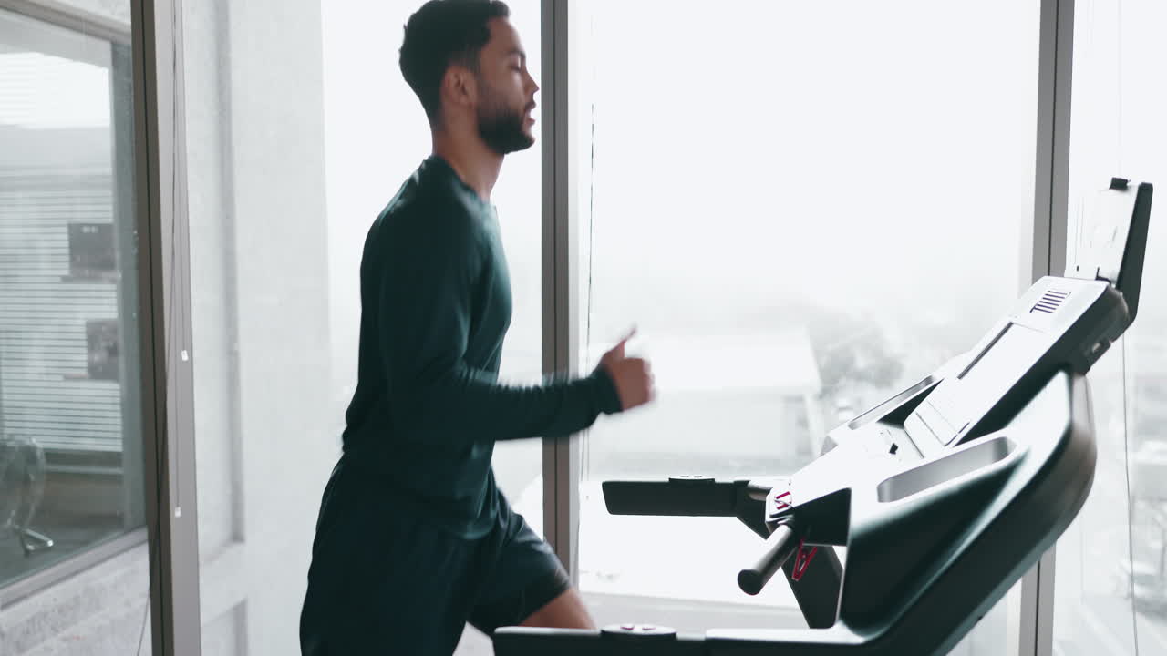 Man, running on treadmill and fitness in gym