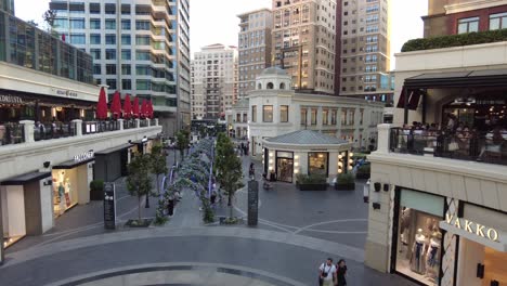 modern urban shopping mall in the evening