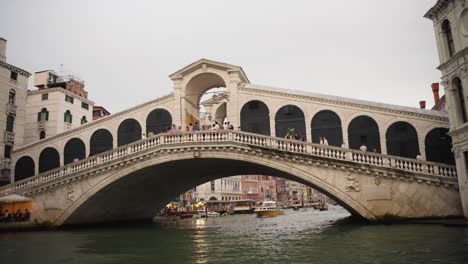 the rialto bridge in venice, italy - pov