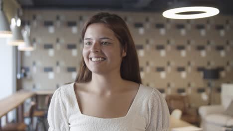 happy young beautiful woman standing and posing