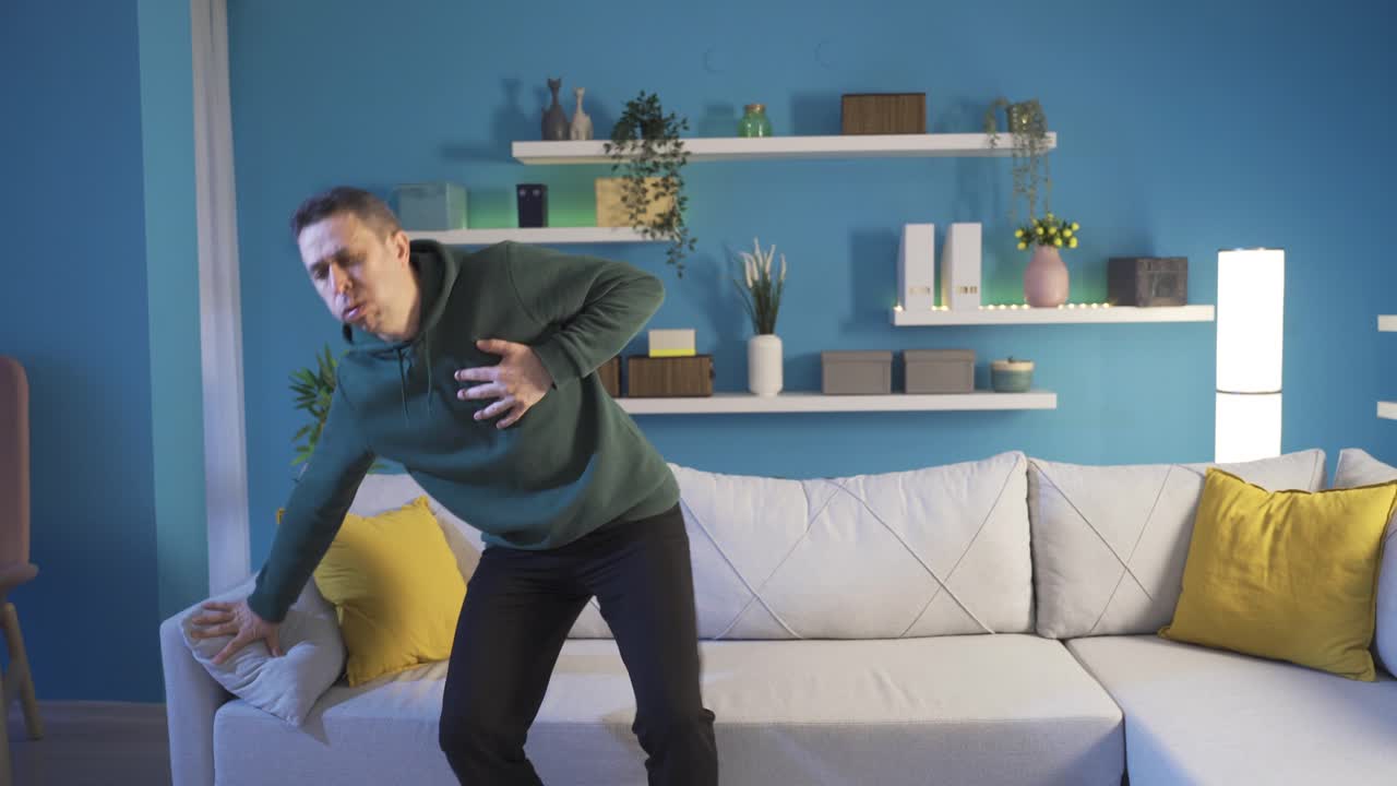 A mature man having a heart attack is having a hard time at home. Heart rhythm disorder.