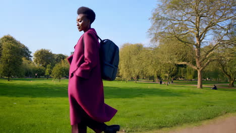 woman walking in a park