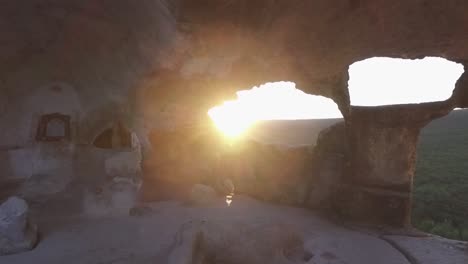 ancient cave church at sunset