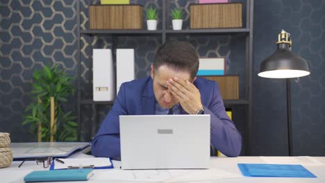 businessman suffering from migraine.