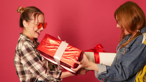 happy friends celebrating with gifts