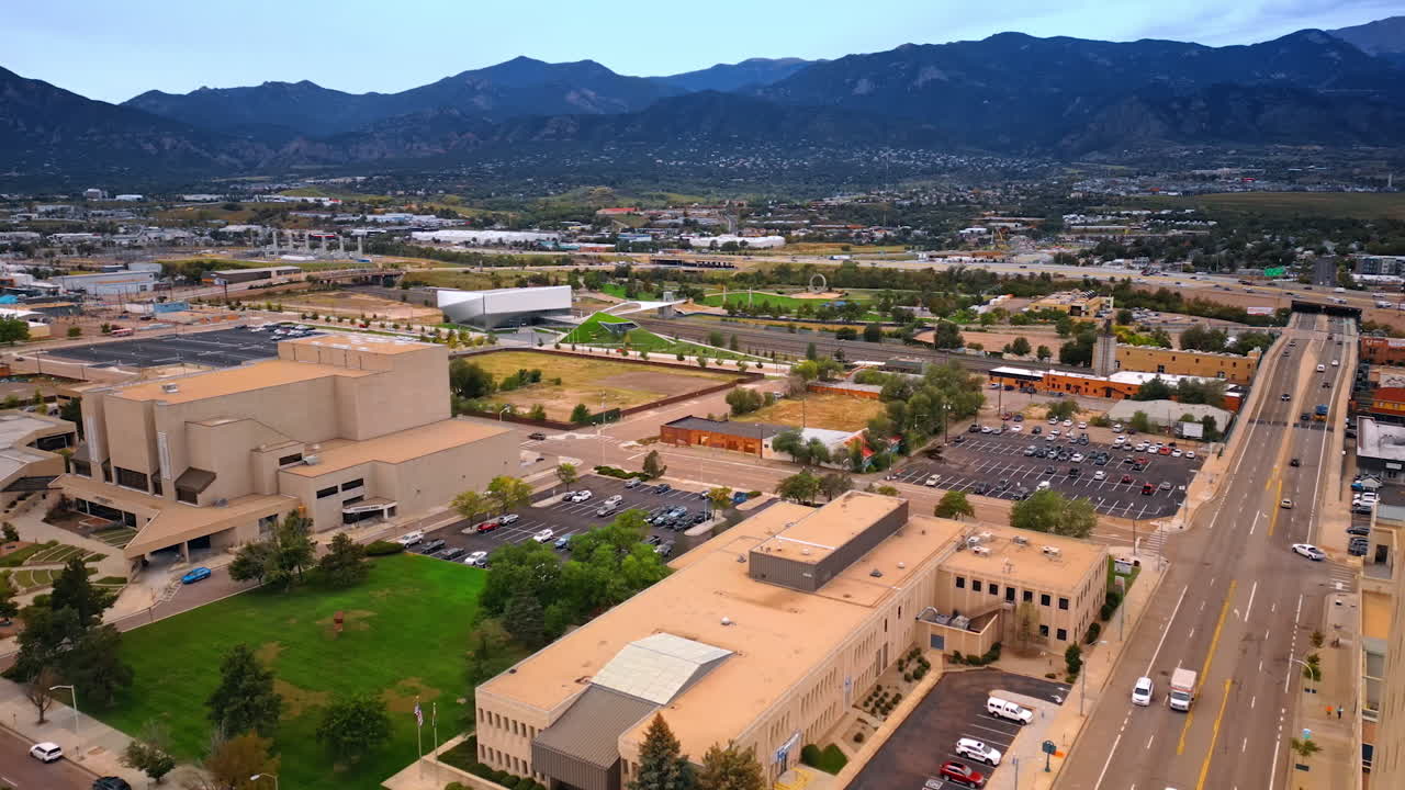 Colorado Springs, USA, 22 July 2025: Panorama of modern Colorado Springs, Colorado, USA. Numerous cars move by the roads of the city and parked on the parking lots