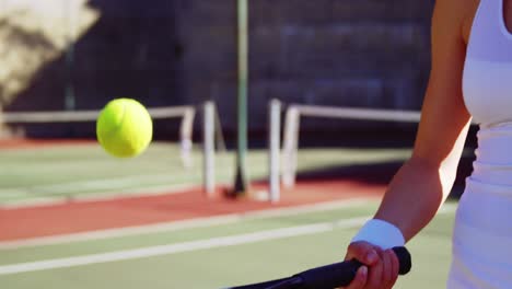 active sportswoman playing tennis
