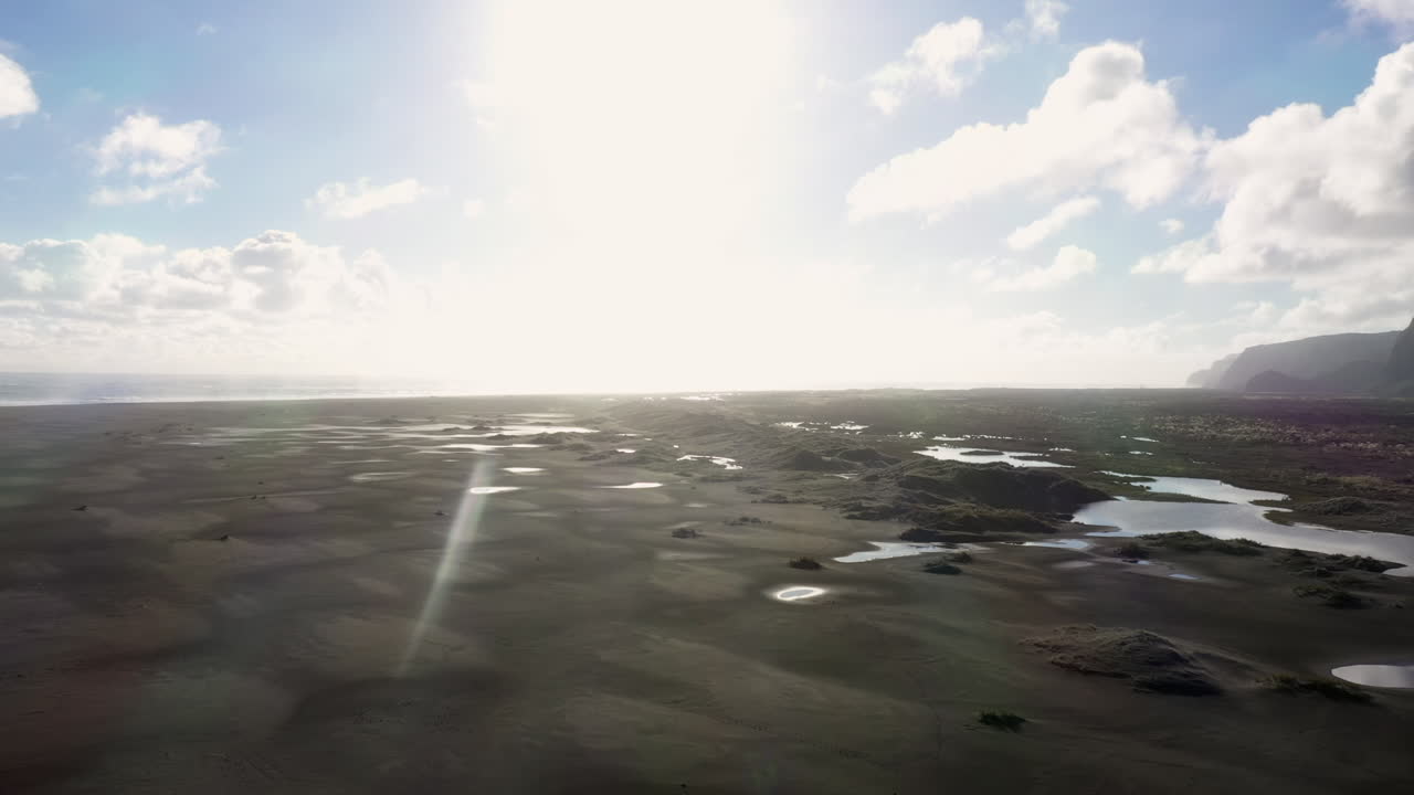 Panorama view of  black sandy Whatipu beach near Huia Reserve, New Zealand