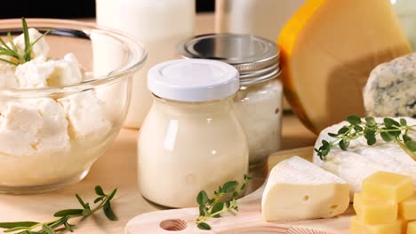 variety of dairy items on wooden board