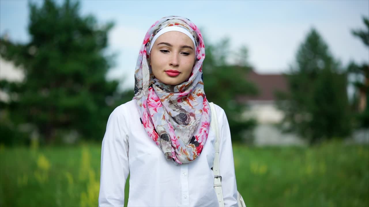 Young Woman in a Floral Hijab