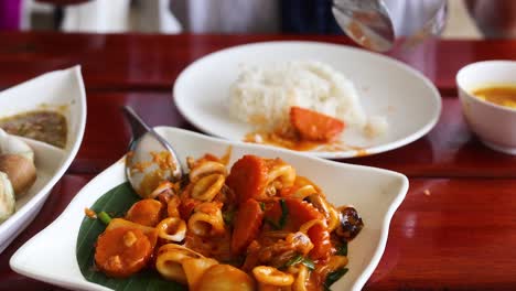 delicious meal preparation and enjoyment in thailand
