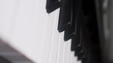 Veritcal-Video-Intimate-Digital-Keyboard-Piano-Keys-close-up-slider-until-end