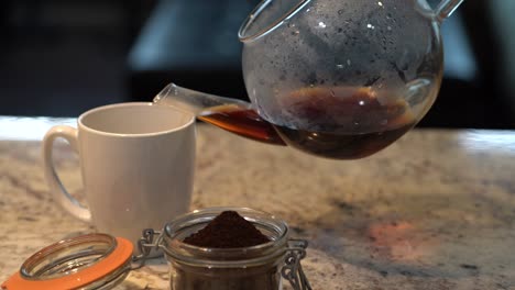 hot coffee poured into a cup