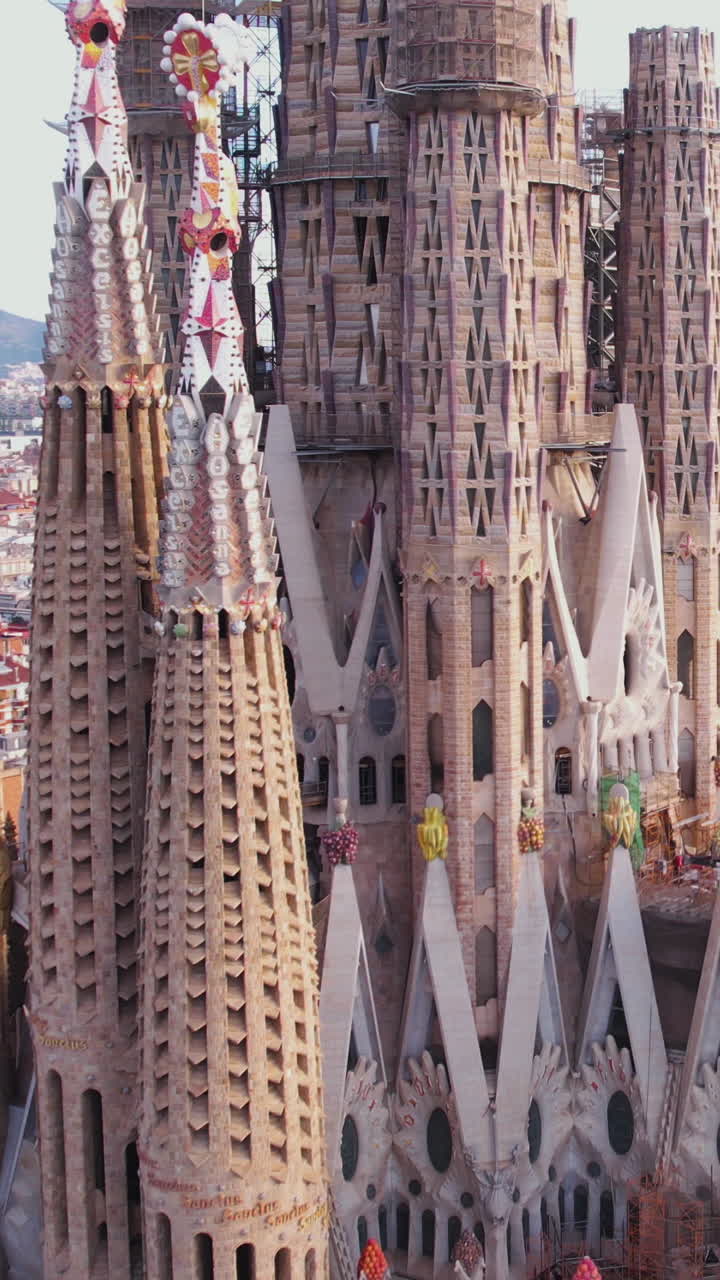 Vertical Drone Shot of Sagrada Familia Basilica, Iconic Landmark of Barcelona, Spain