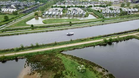 Aerial-footage-of-the-yacht-or-boat-crossing-the-canal