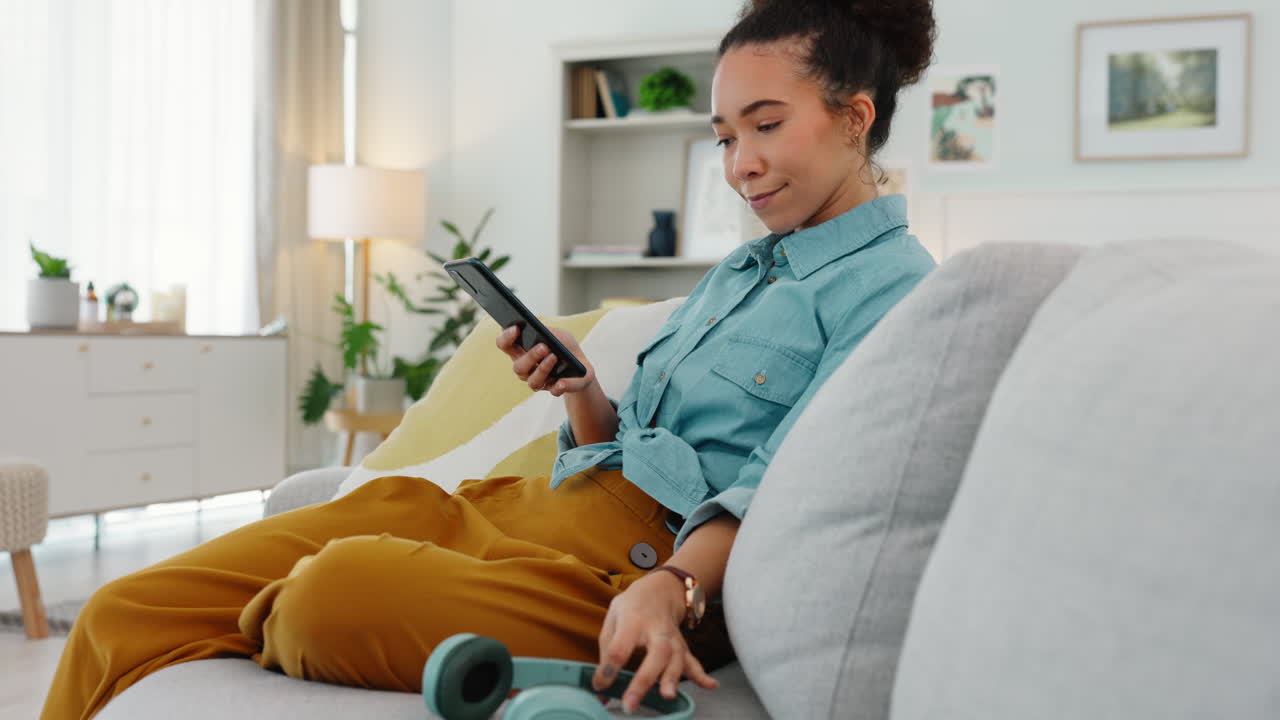 Woman Listening to Music at Home