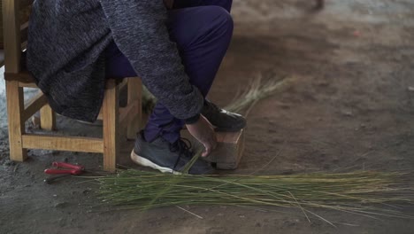 An-artisan-in-Tucumán,-Argentina,-making-crafts-with-skill,-showing-traditional-crafts-and-cultural-heritage