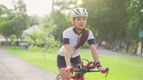 woman cycling in park