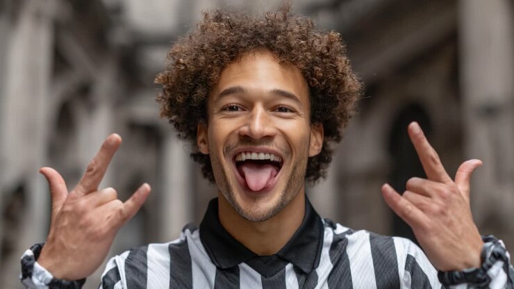 Joyful Expression of Enthusiasm and Excitement from a Cheerful Person in a Striped Shirt, Captured in Two Dynamic Frames with Distinct Gestures and Emotions