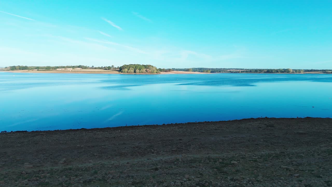 Calm Rutland Water view, serene atmosphere on a sunny day