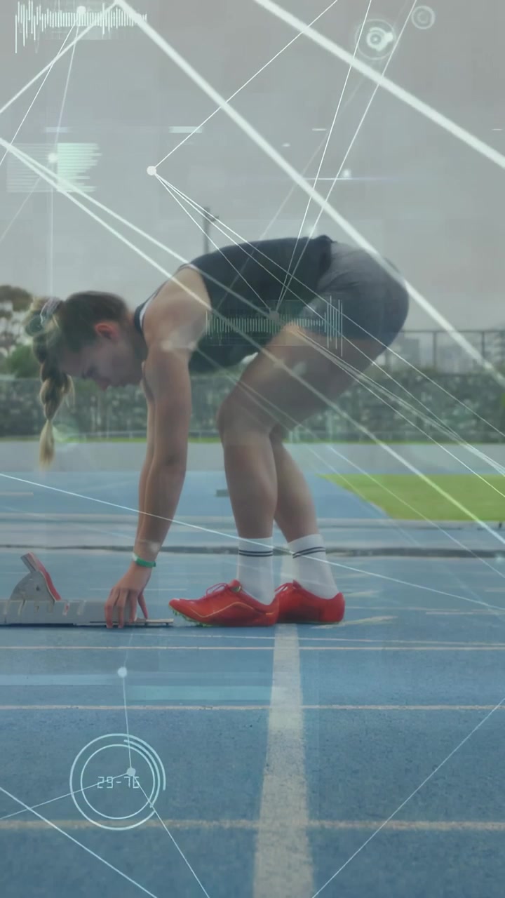 Track athlete adjusting block, aligning feet on blue lane with HUD overlaying lane, preparing start