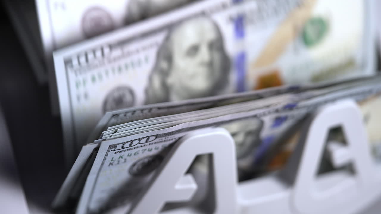 Machine for counting money. Cash electronic banking counter with a lot of dollars. Money and economics concept. Vertical view