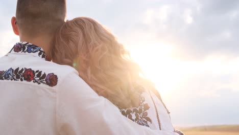 happy ukrainian couple in love dressed in embroidered clothes beautiful sunset happy ukrainian couple in love dressed in embroidered clothes beautiful sunset ukraines victory in the war