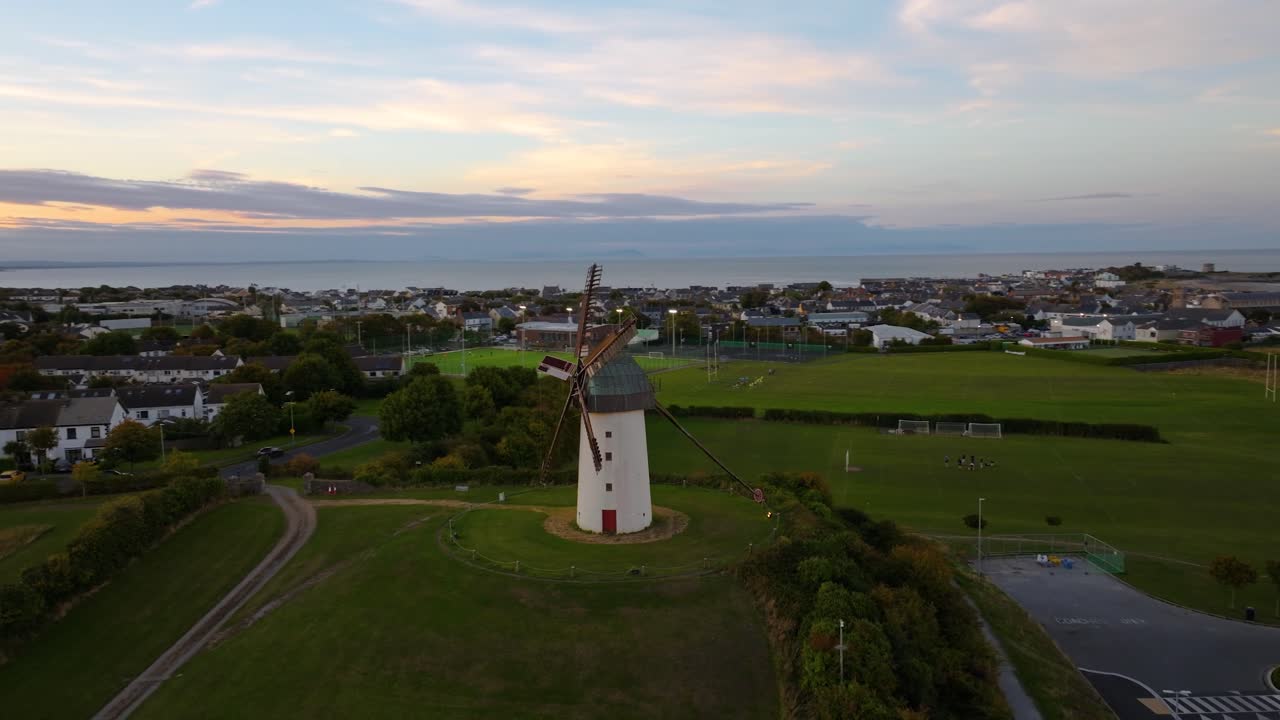 4K High-resolution drone shot of the historic Skerries windmills, at the sunset Co.Dublin, Ireland_03