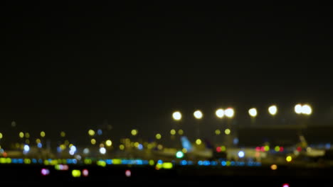 blurred night airport scene