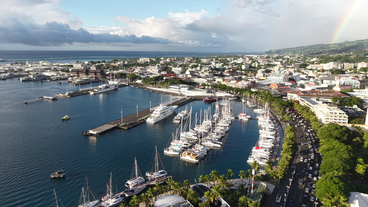 Papeete, Tahiti, French Polynesia. Drone Shot of Coastal Traffic, Harbor and Buildings