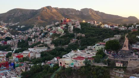 AERIAL:-Guanajuato-City-and-The-Pipila,-Mexico