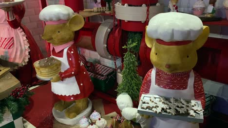 Models-showing-Christmas-cookies-for-sale-at-the-Christmas-presentation-held-at-a-garden-centre-in-Leicestershire-UK