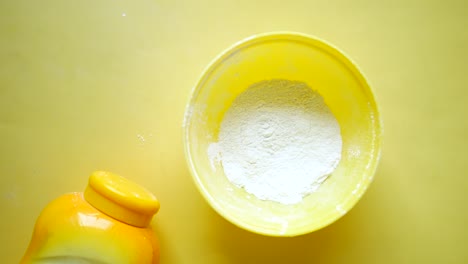 Top-view-of-baby-powder-on-white-background