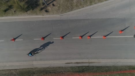 aerial view of cyclists in the street competing