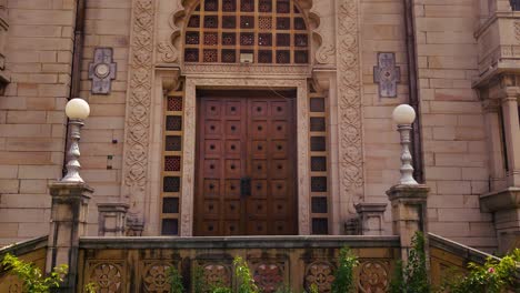 close-up footage of kirti mandir's ornate entrance and intricate architectural details in vadodara, gujarat. ideal for cultural, historical and travel projects.