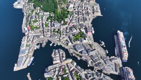 top down aerial view, alesund norway, harbor and city buildings, high angle drone shot 60fps