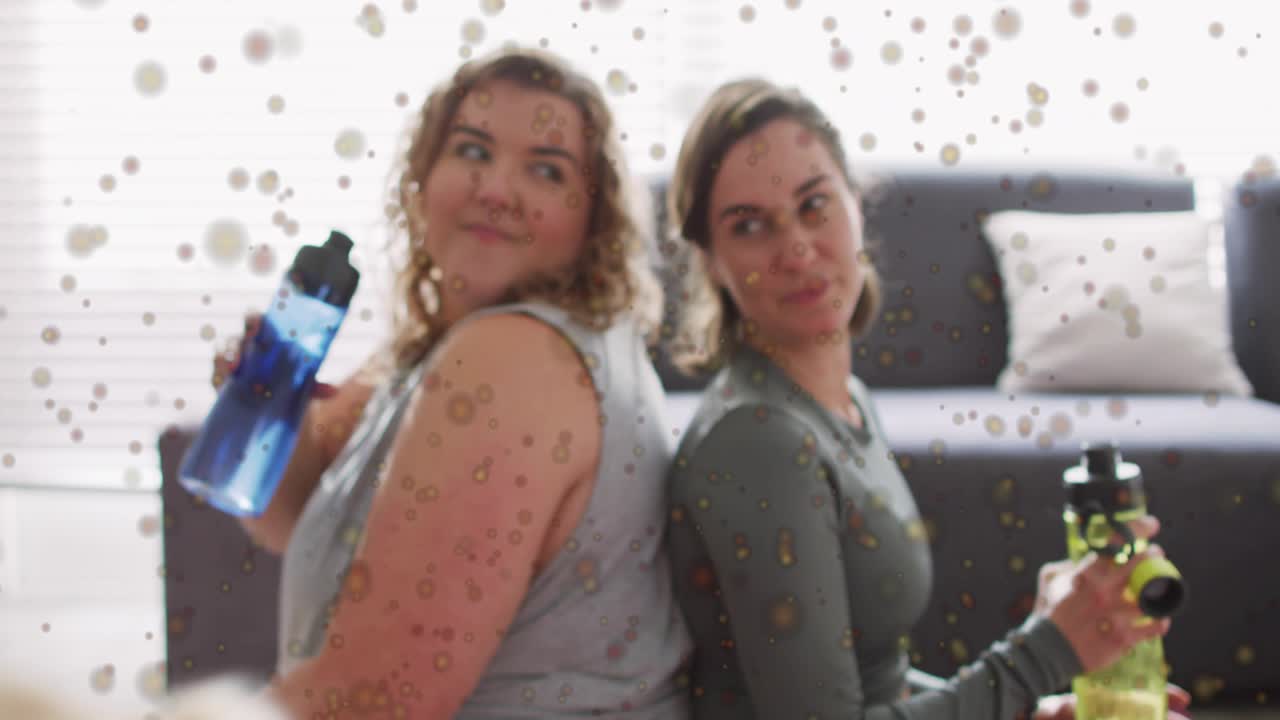 Dog filling frame as fitness duo sitting glancing causing bottle sips hydrating floating particles