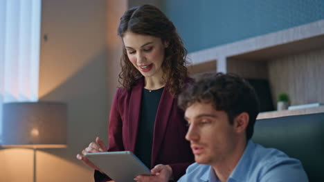 coworkers video calling laptop presenting business project in office close up.