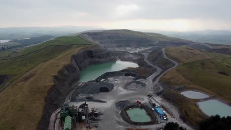 cinematic aerial drone footage of breedon roan edge quarry, kendal, cumbria, uk