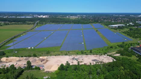 large solar farm in germany, providing clean and sustainable energy. unique aerial view flight panorama overview drone