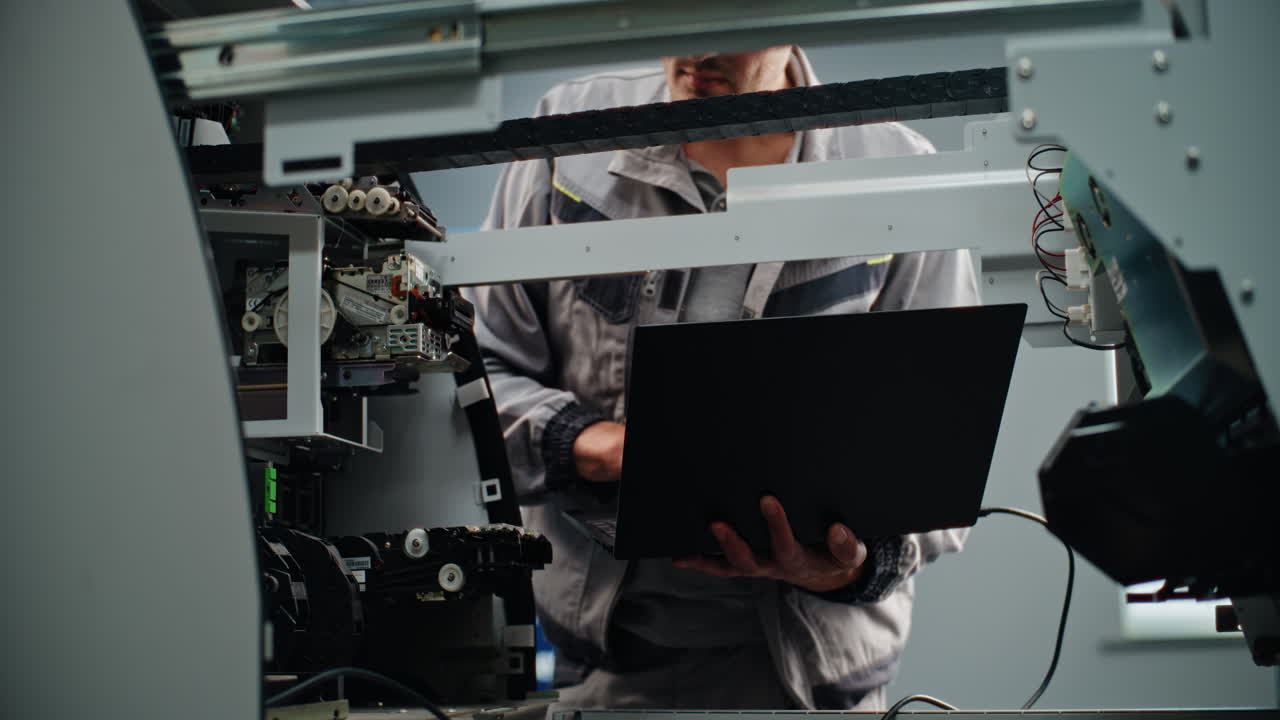 ATM Technician Working on a Machine