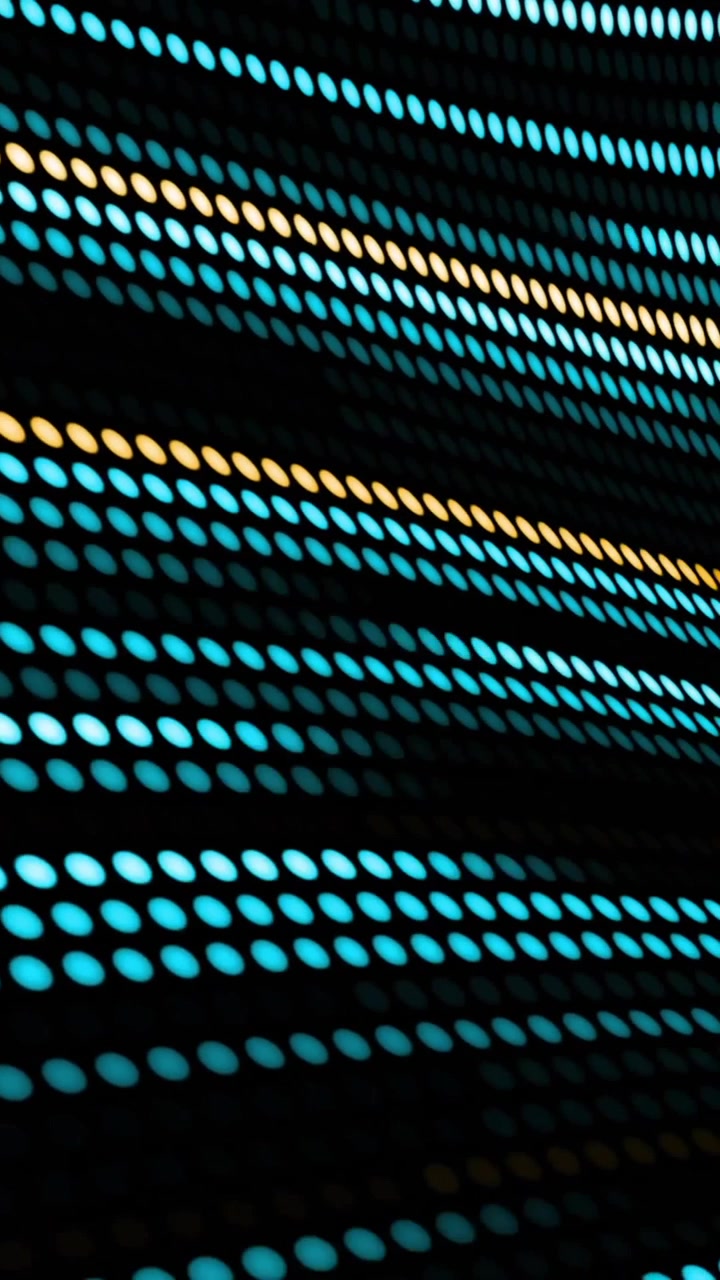 Animation of colourful moving spots on black background