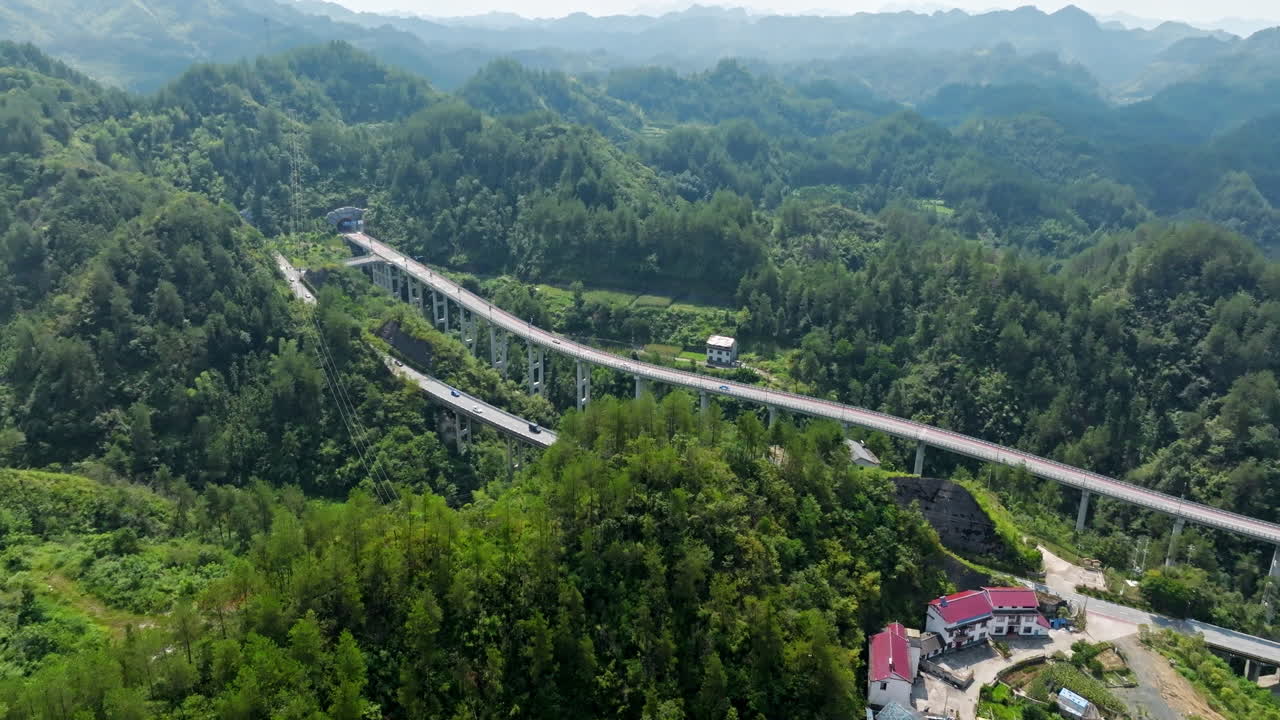 Panoramic drone shot rotating in front of highway bridges, in Zhangjiajie, China