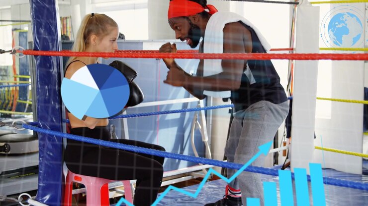 Coach leaning and gesturing boxer mirroring guard in boxing ring while HUD tracking performance