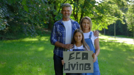 happy family promotes eco-living in the park