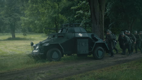 german soldiers and military vehicle