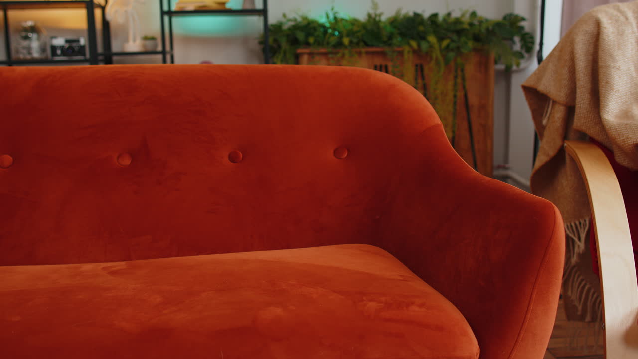 Exhausted young alcoholic drunk man flopped down on sofa falls asleep after party tired overworked