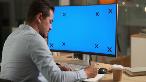 mockup screen, writing and man with notebook