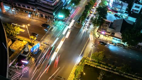 4k.time lapse traffic at intersection bangkok thailand